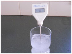 Cold temperature test - image shows thermometer in an ice filled glass container