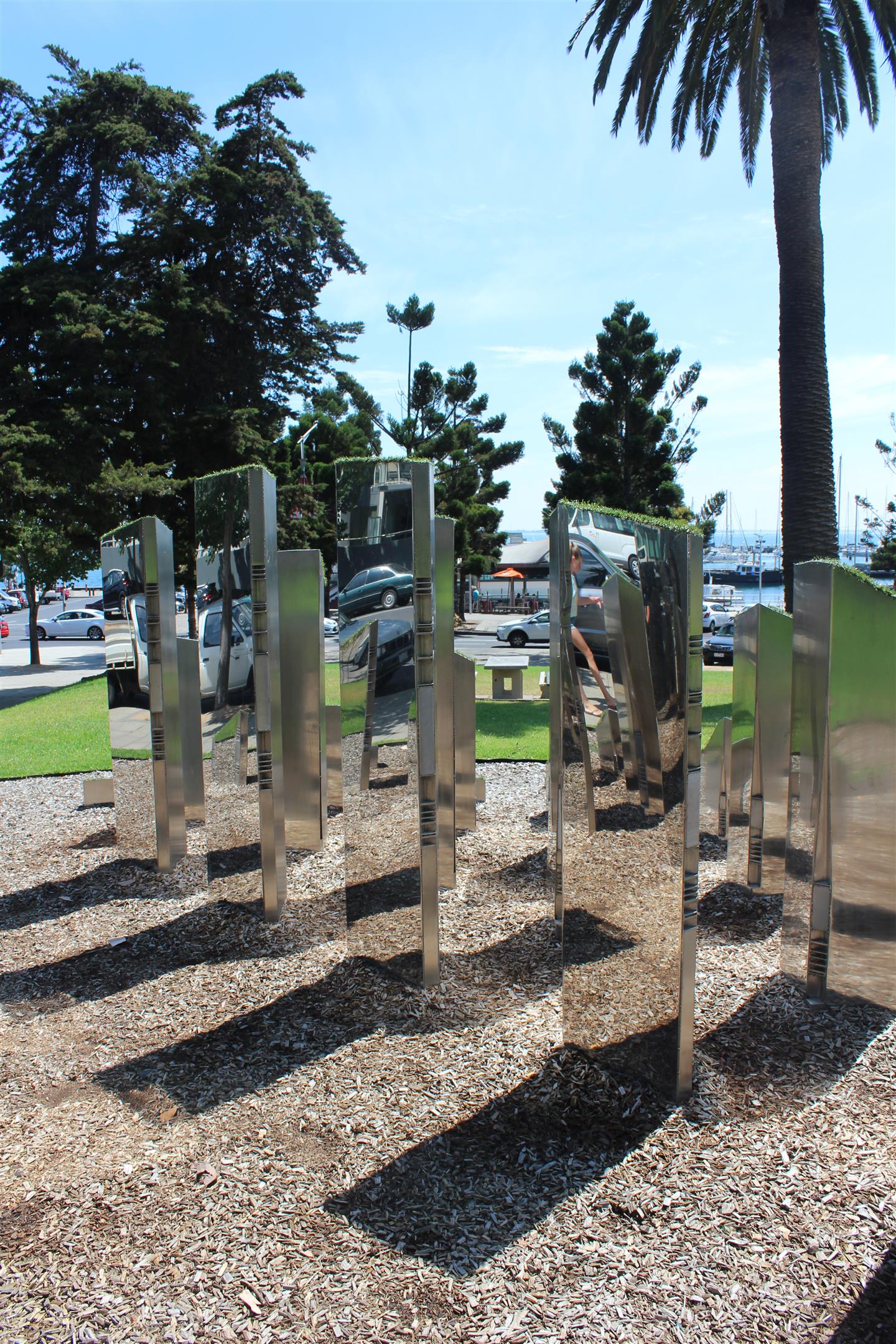 Public art sculpture of silver pillars