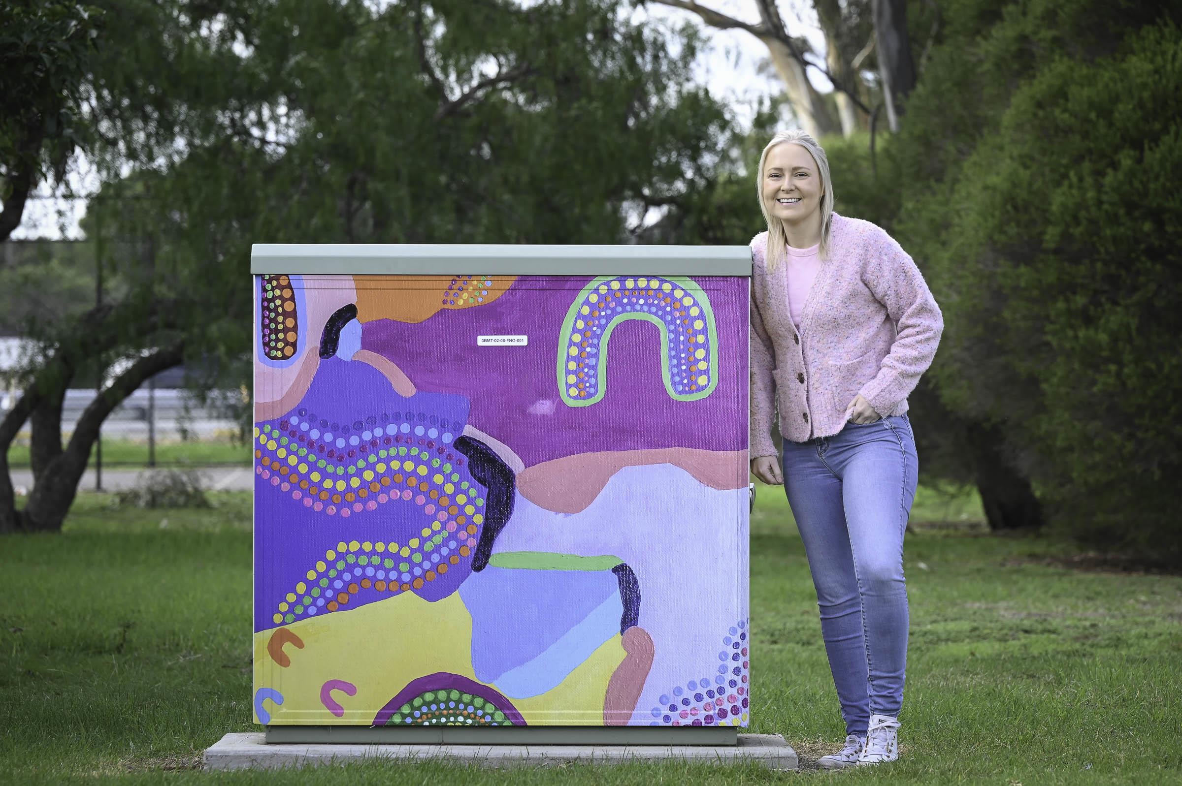 Jenna Oldaker In Front Of Her Artwork Ton Ton (Brain) - First Nations NBN Box Art