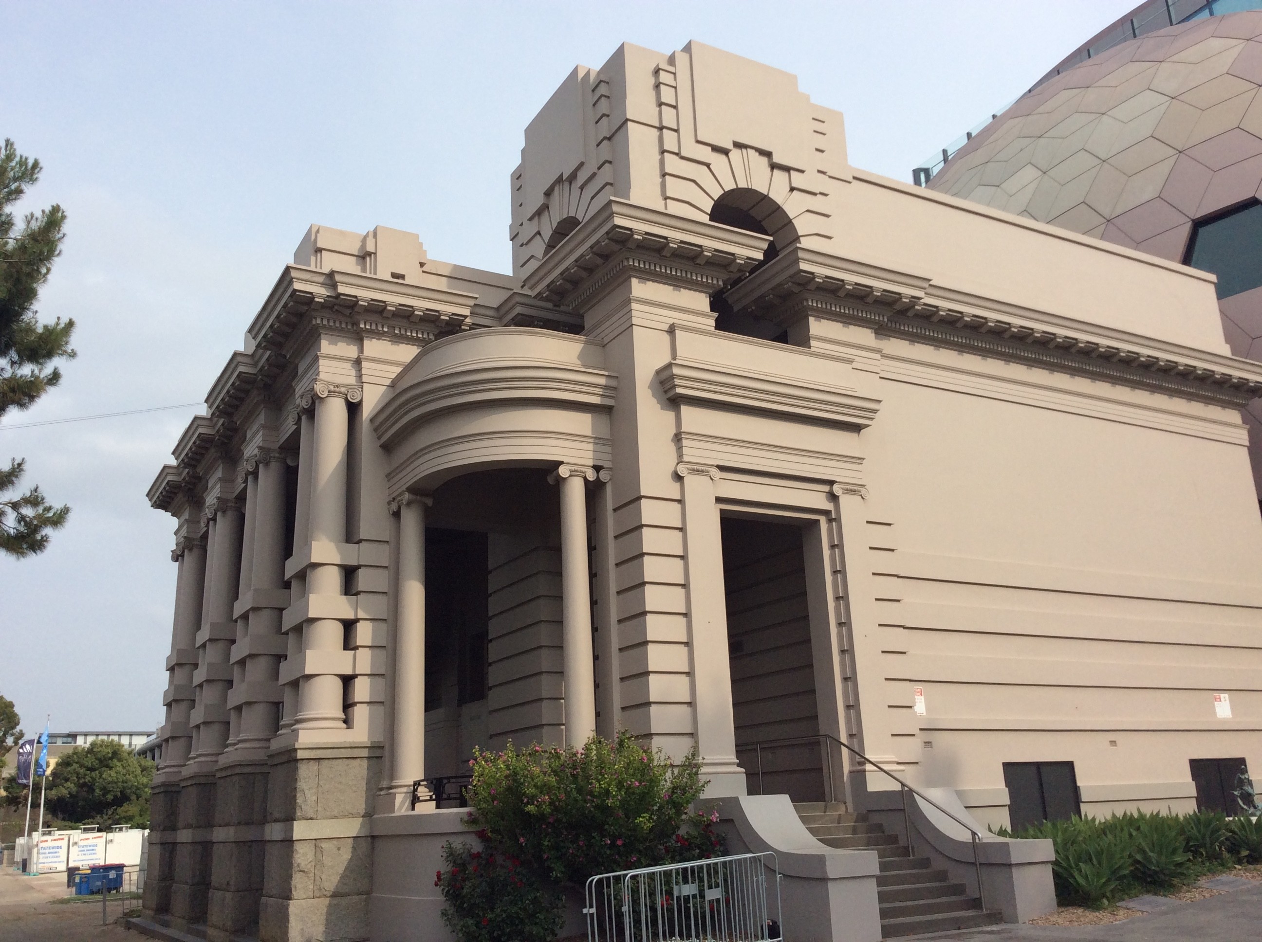 Heritage listed building with ornate columns and entrance way.