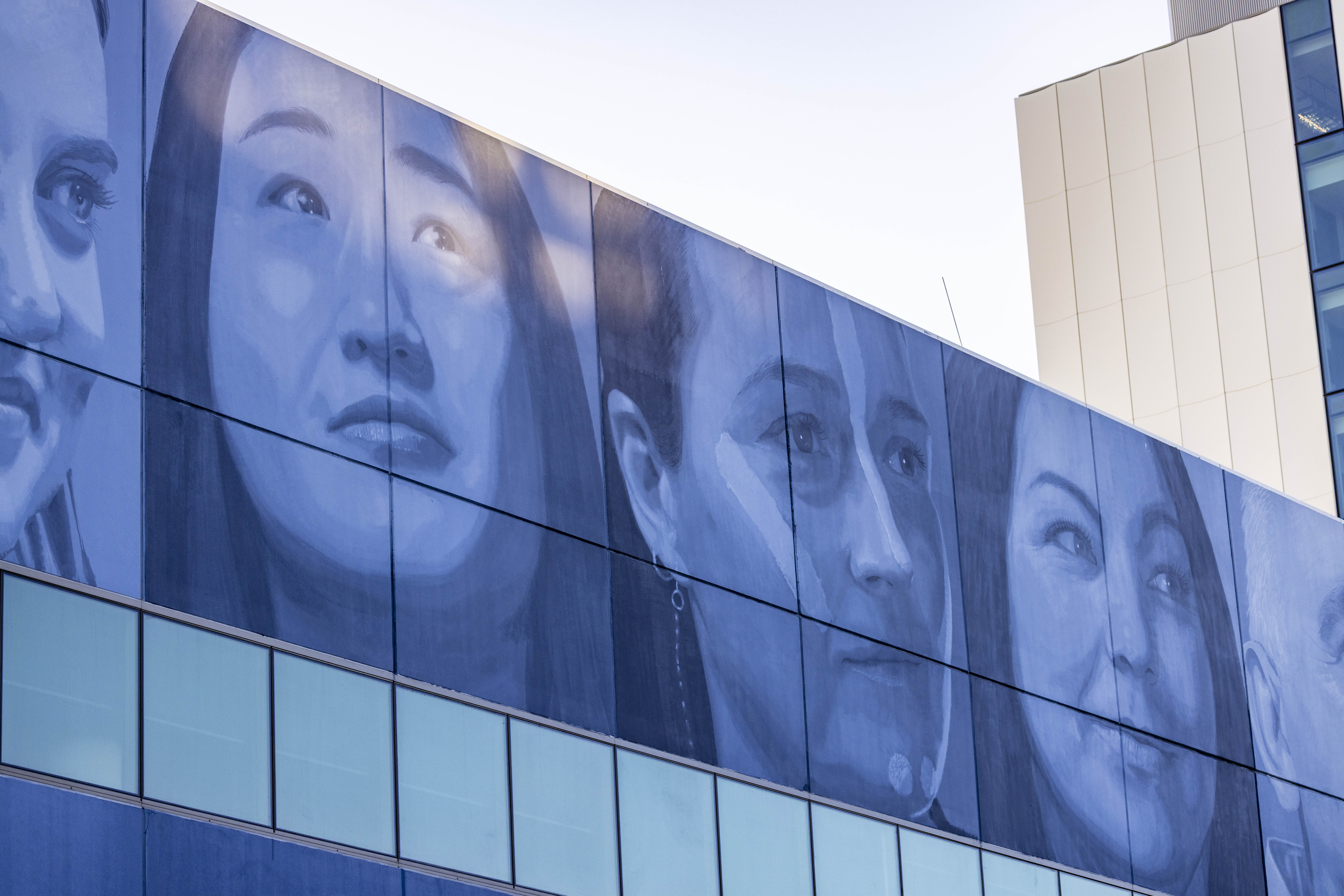 Blue tone large scale mural of portraits
