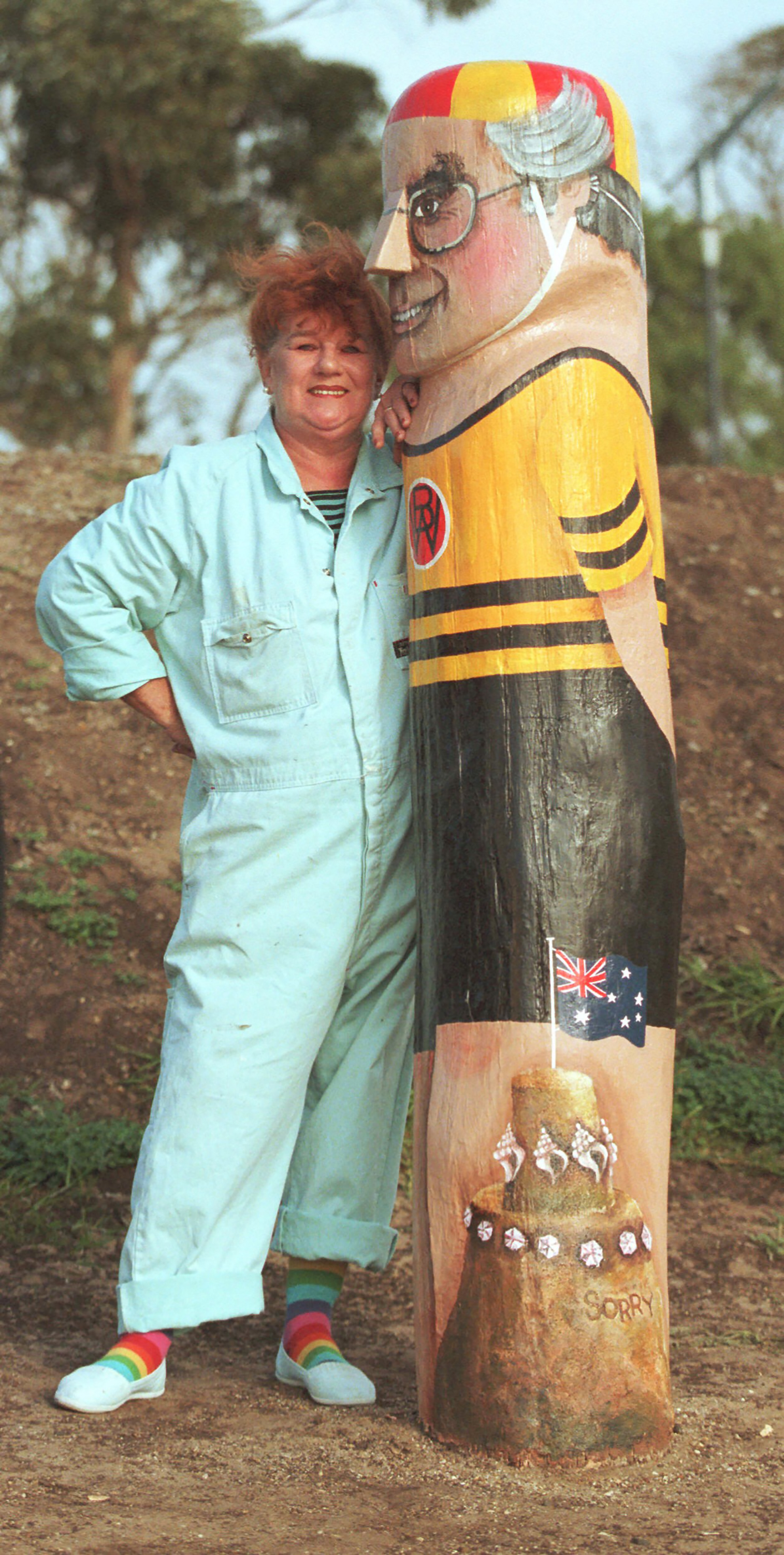 Artist Jan Mitchell with one of her lifesaver bollards