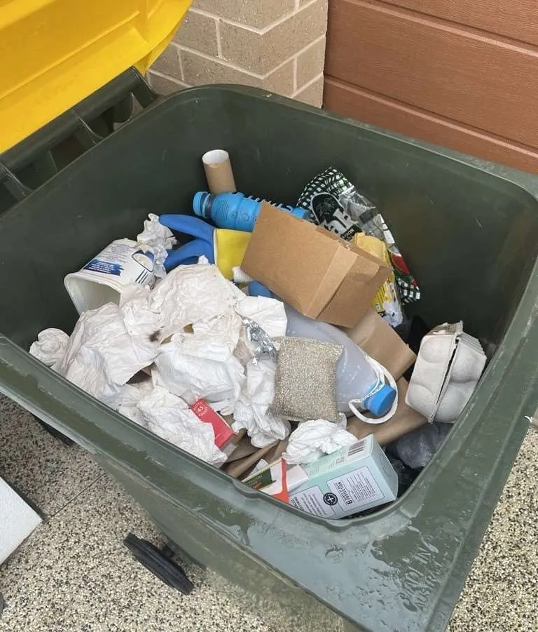 Common contamination in recycling includes soft plastics and paper towels.