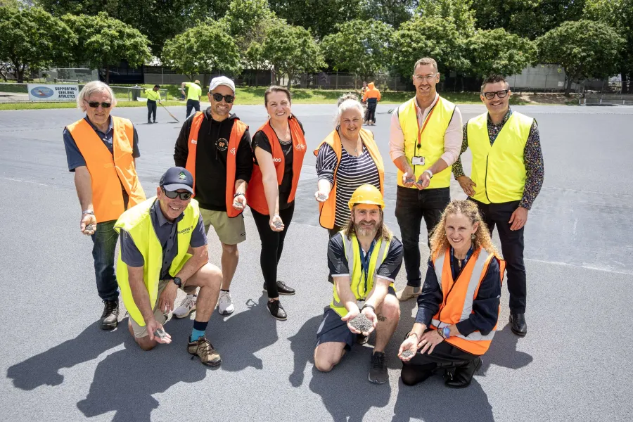 Acting Executive Director City Life Pam Newton (front right), Executive Director City Infrastructure James Stirton (rear right), Venue Manager Dan Dempster (second right, front row) and SSL Facilities Lead Danny Hickin (second right, rear) from City of Greater Geelong inspect track works with Landy Field stakeholders.