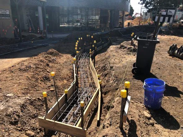 Retaining wall footings