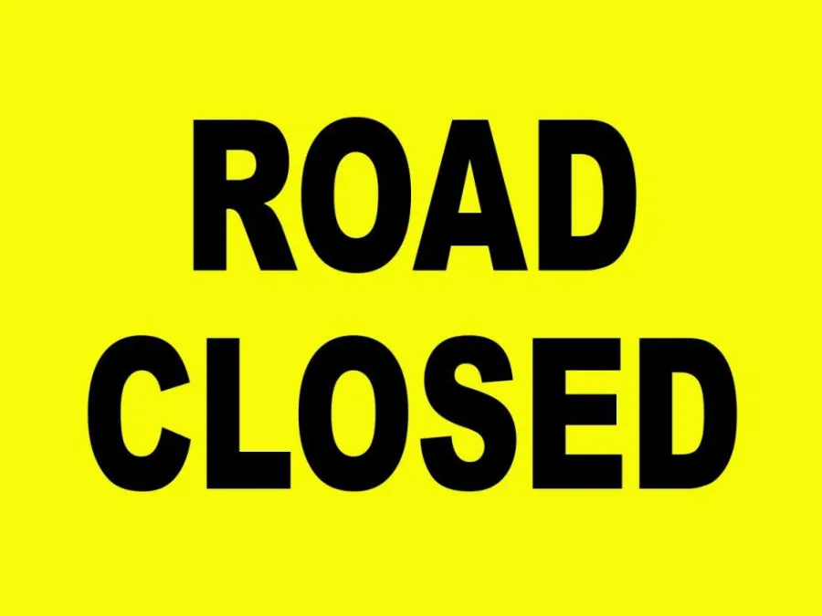 Signage located at a road closure to warn the road is not accessible to the general public.