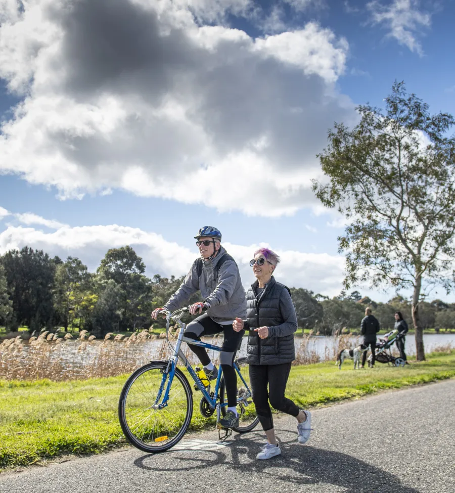 Cyclist riding bike along the Barwon River.