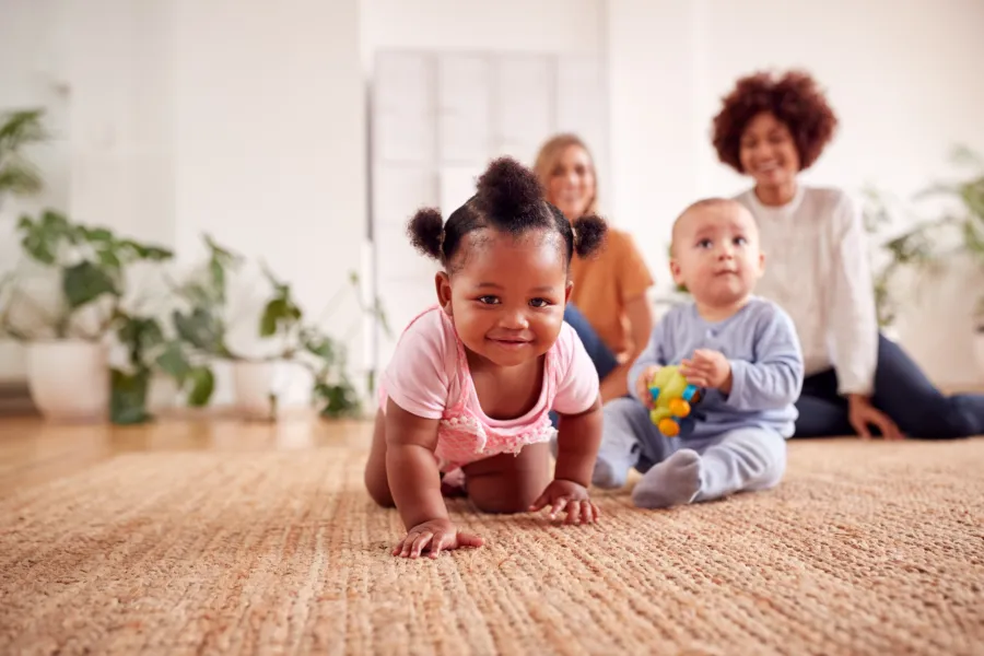 Babies crawling; playgroups