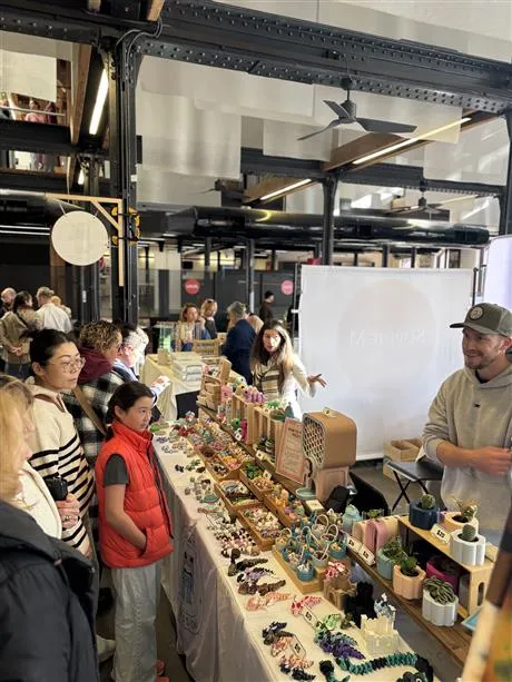 People at a market stall