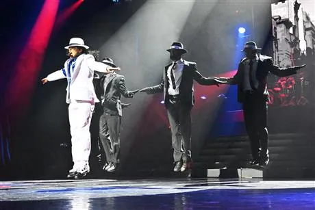 Michael Jackson Michael Jackson on stage in white suit