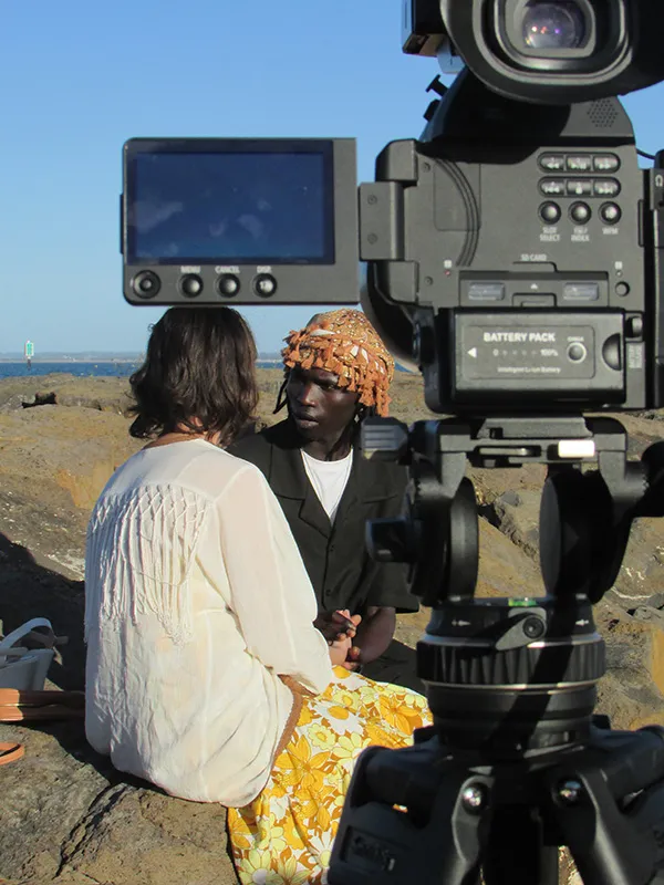 North Youth Theatre Arts Projects Grant Recipient - image courtesy of Fiston Baraka two people on a movie set with video camera
