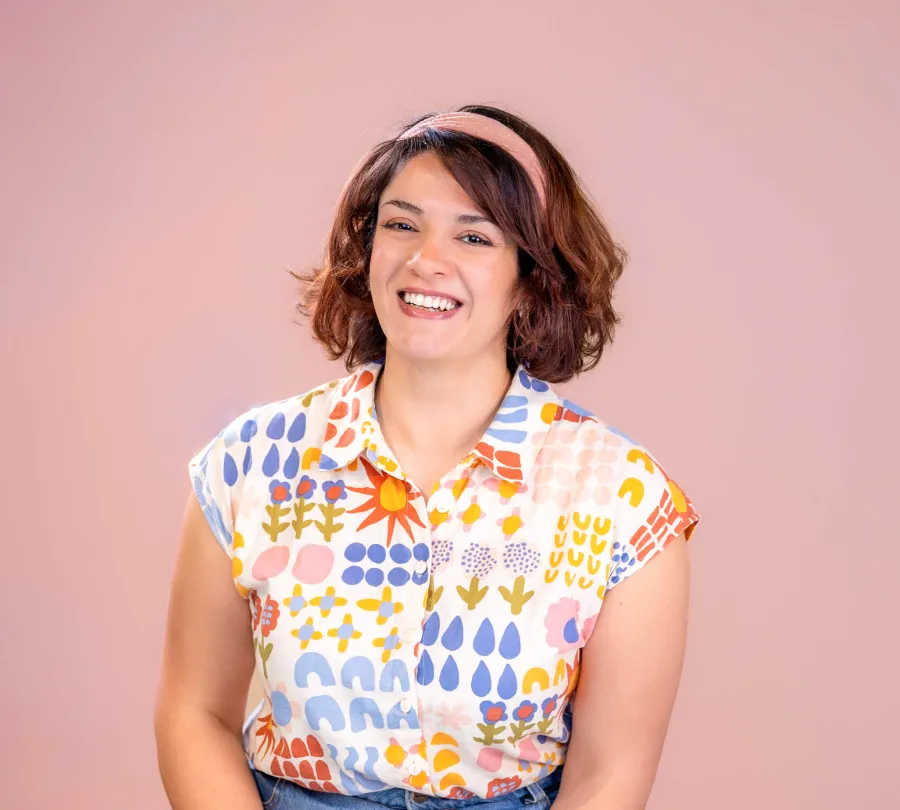 Portrait of woman with bright shirt and headband