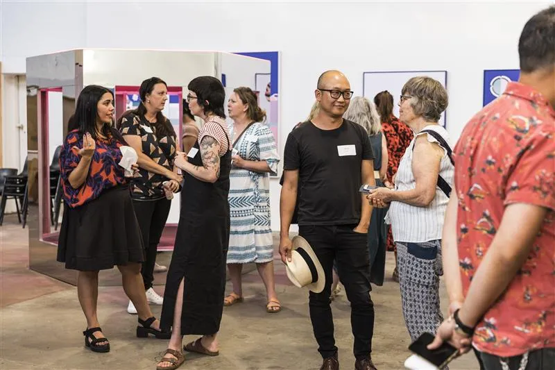 Image of people at an art exhibition