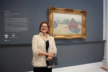 woman Infront of painting