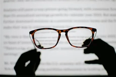 image of classes Infront of computer screen