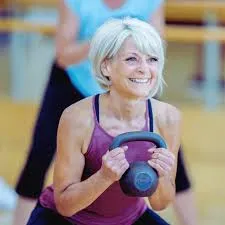 woman using weights for strenght