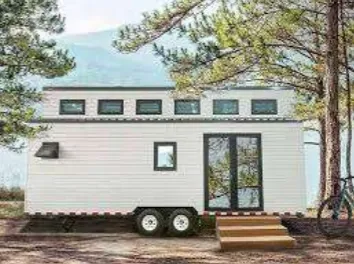 Tiny Home Tiny white home on wheels
