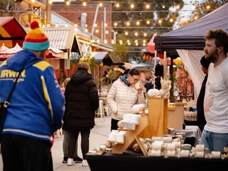 People browsing market stalls