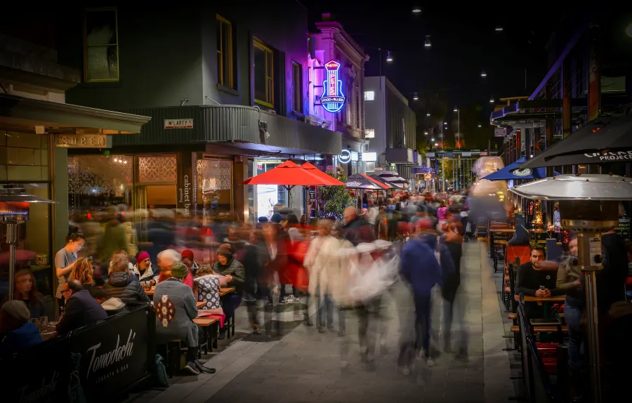 image of nighttime in little malop street enjoying outdoor dining