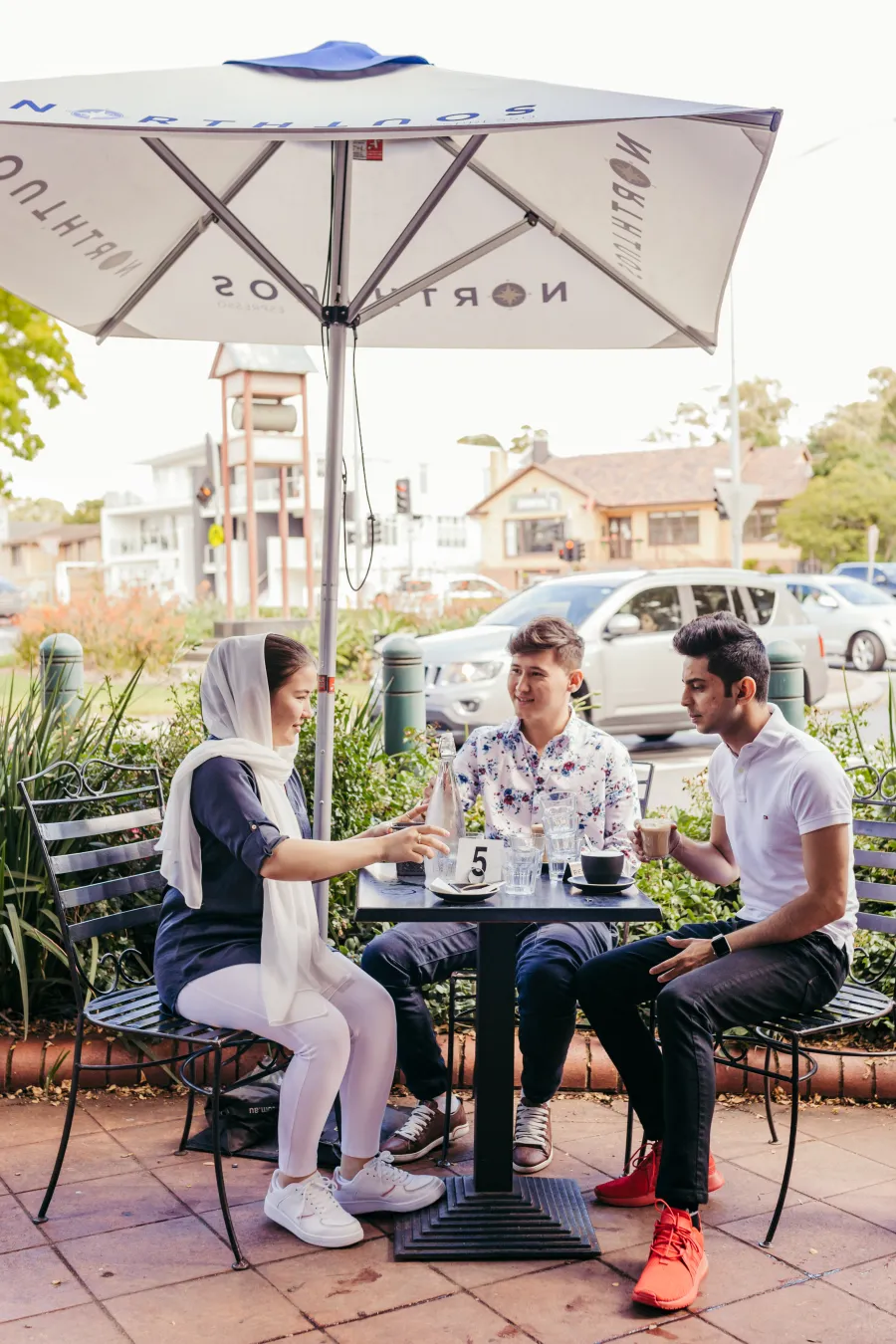 Young people enjoying outdoor dining 
