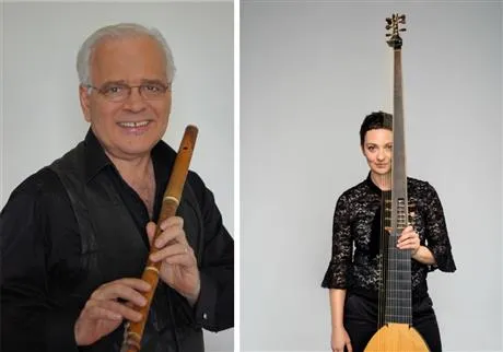 Image of 2 people with musical instruments