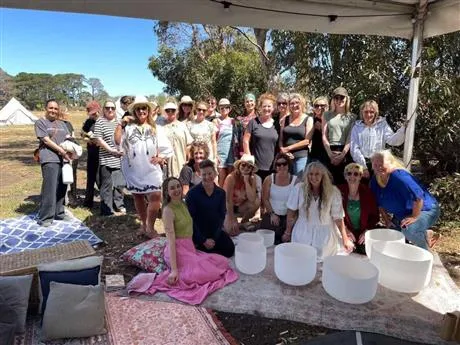 Image of people with singing bowls