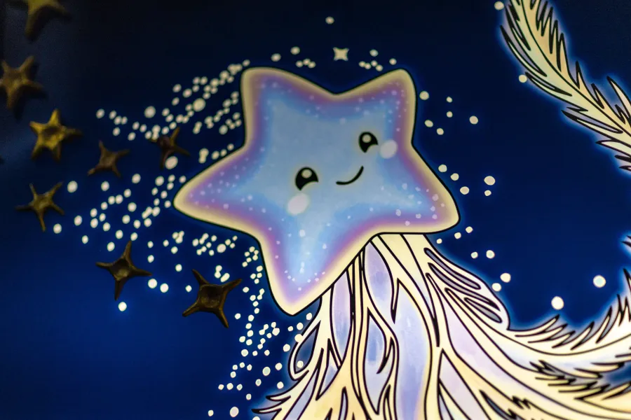 A smiling purple star