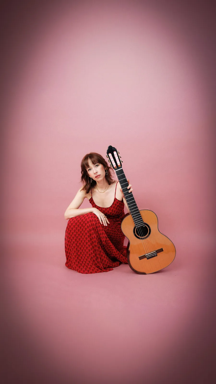 Image of Kasia with a guitar