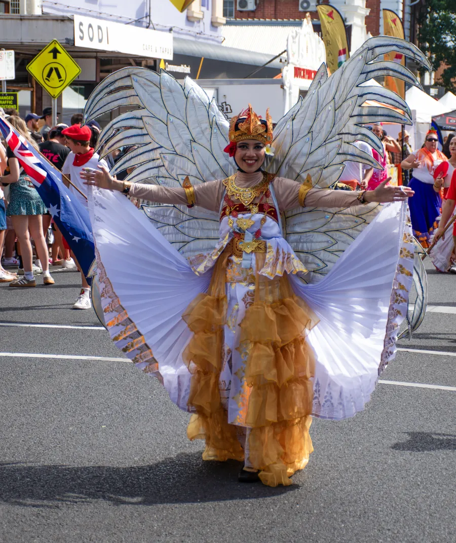 Woman in cultural butterfly outfit