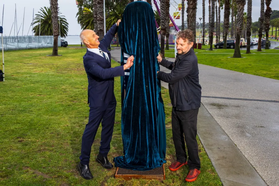 Mayor Stretch Kontelj OAM and Caolan Mitchell unveil the new fibreglass composite prototype at the waterfront