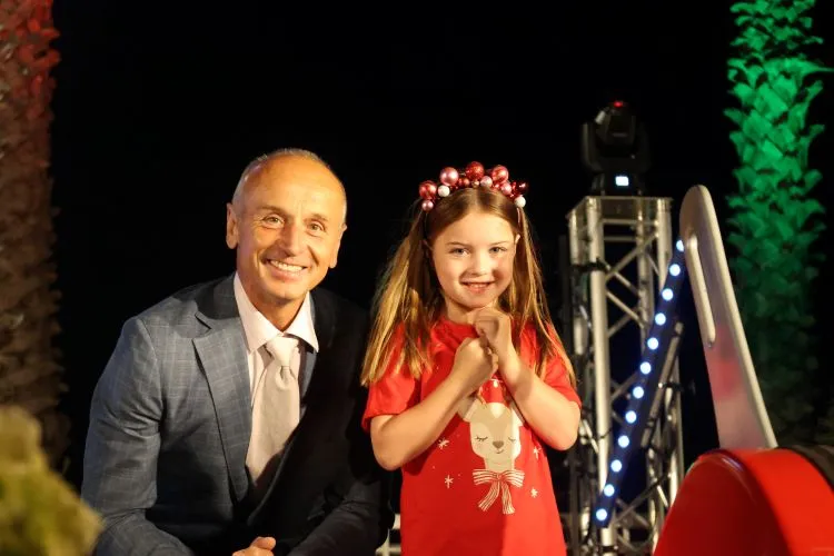 Mayor Stretch Kontelj and Charlotte Rockafeller light the Floating Christmas Tree in 2025.