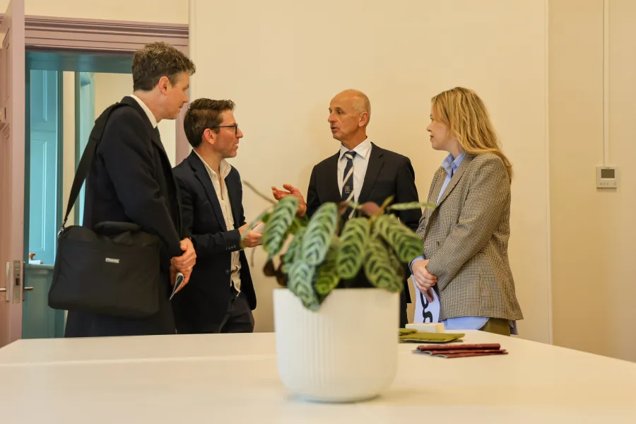 Four people talking