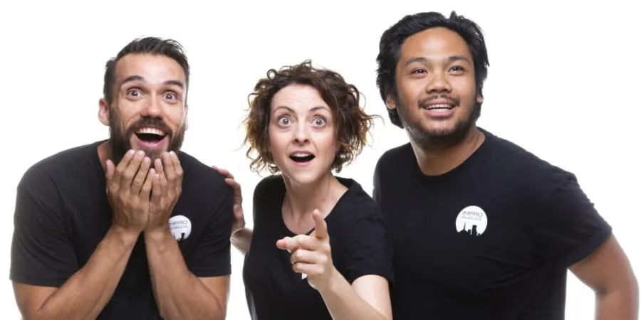 Three people looking surprised, posing in front of white background.