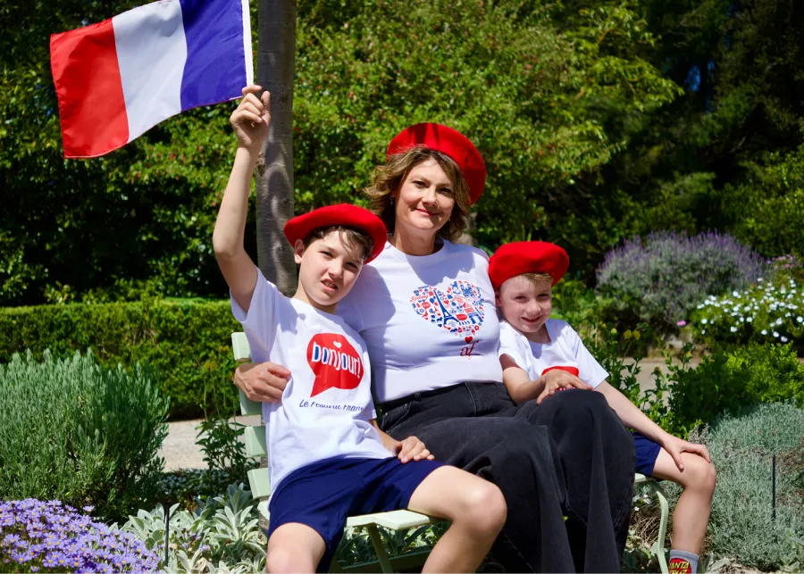 Le Festival Francais Image of family having fun and wearing red berets