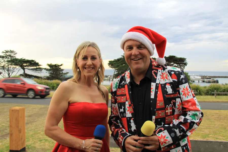 M.C.'s Julie Rock and Leroy Brown Image of M.C.'s Julie Rock and Leroy Brown wearing Christmas hat