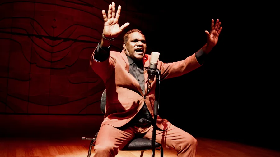 Ngulmiya performing on stage.