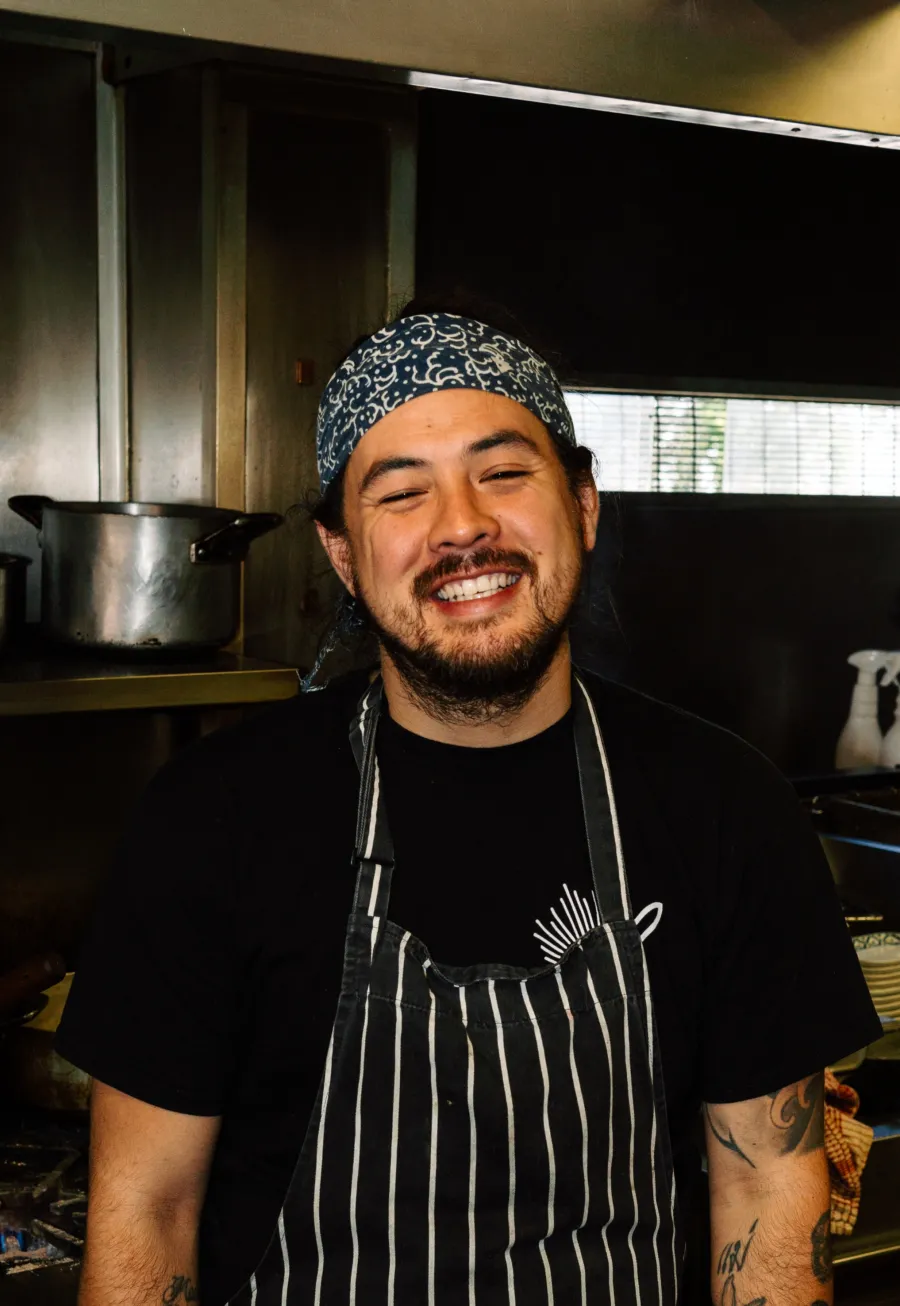 Nathan Phayu Brown Image of Nathan Phayu Brown smiling in the kitchen
