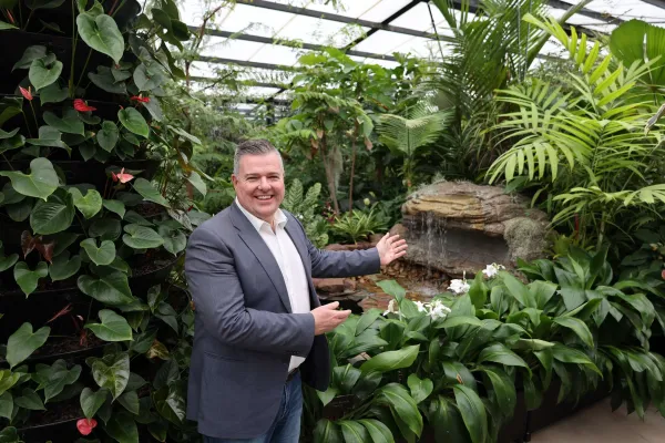 Cr Anthony Aitken with the new fountain in Geelong Botanic Gardens Conservatory