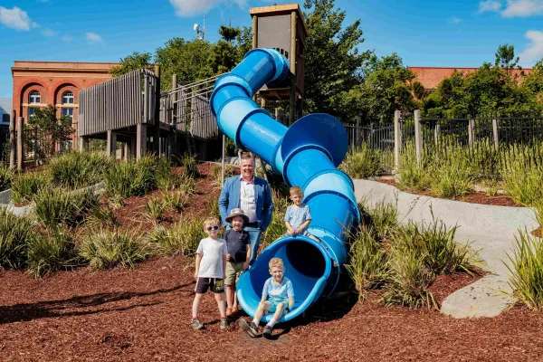 Deputy Mayor Anthony Aitken with Seth, Ari, Freddy and Spencer celebrating the reopening of Poppy Kettle Playground