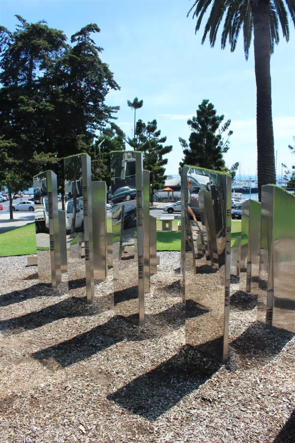 Grassy Mole Public art sculpture of silver pillars