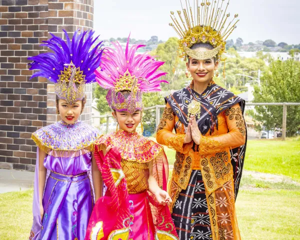 Community members in traditional dress at Pako Festa.