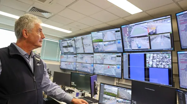 Man watching city safe cameras