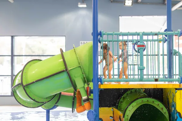 Kids playing on waterslide at Bellarine Sports and Aquatic Centre