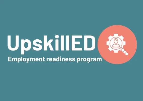 UpskillED employment readiness program on a dark green blue background with an orange circle adjacent and in the middle is a magnifying glass