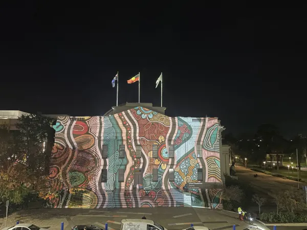 Work by artist Chloe Chatterton projected onto City Hall