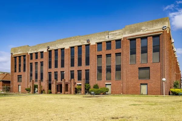 Historic red brick building the Corio Distillery