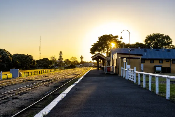 Historic yellow weatherboard train station on the Queenscliff Railway
