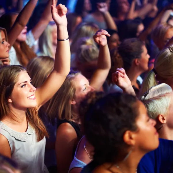 Photo of people at a live music event