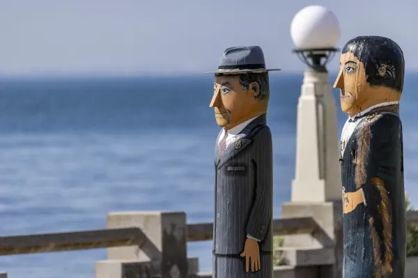 Ian McDonald and Robert Johnston Two painted bollards, one dressed in grey suit and hat, the other in mayoral regalia and robes.