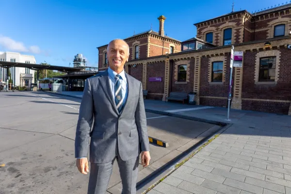 Mayor Stretch Kontelj standing in front of Geelong Railway Station